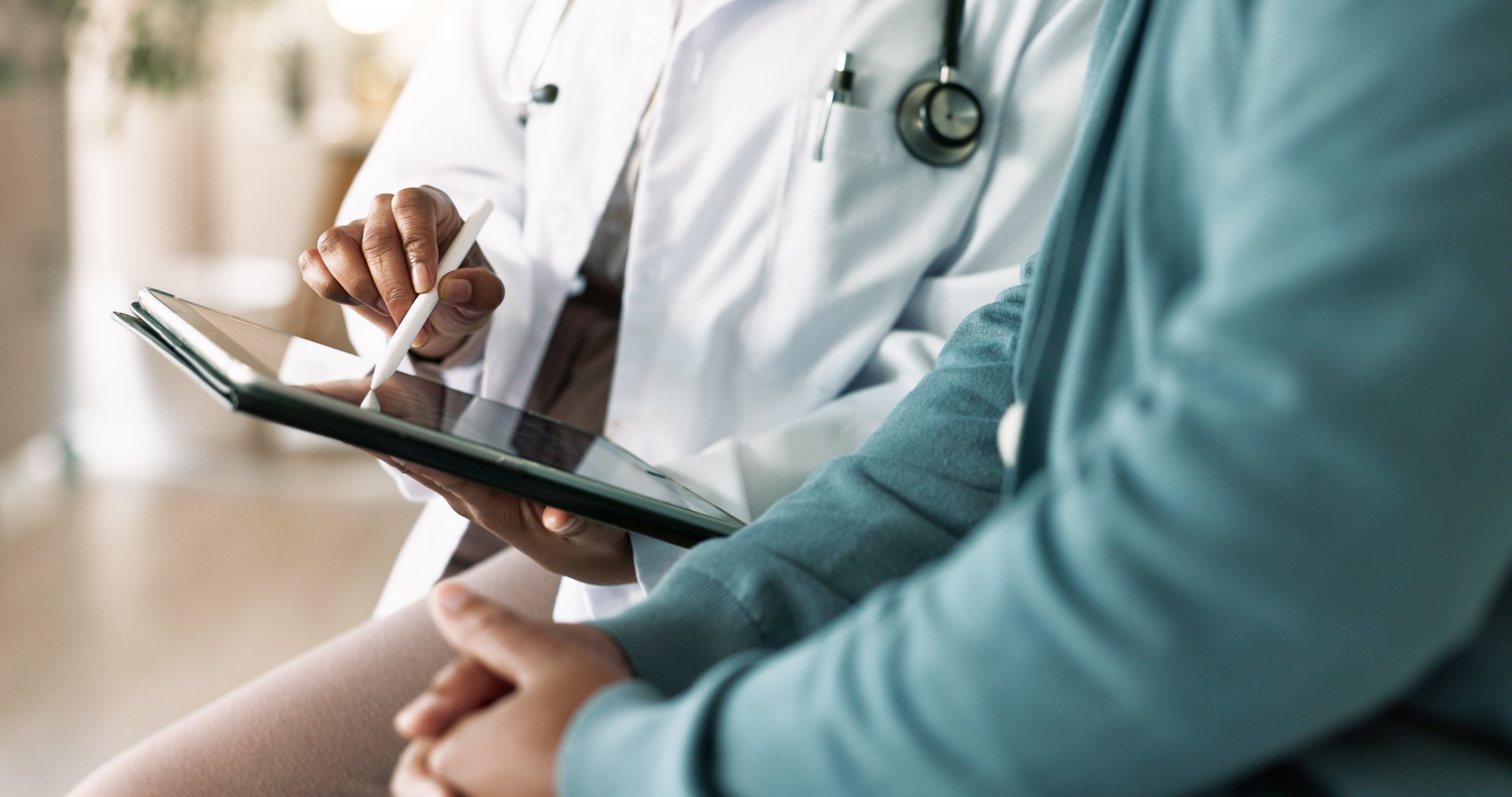 Doctor showing patient data